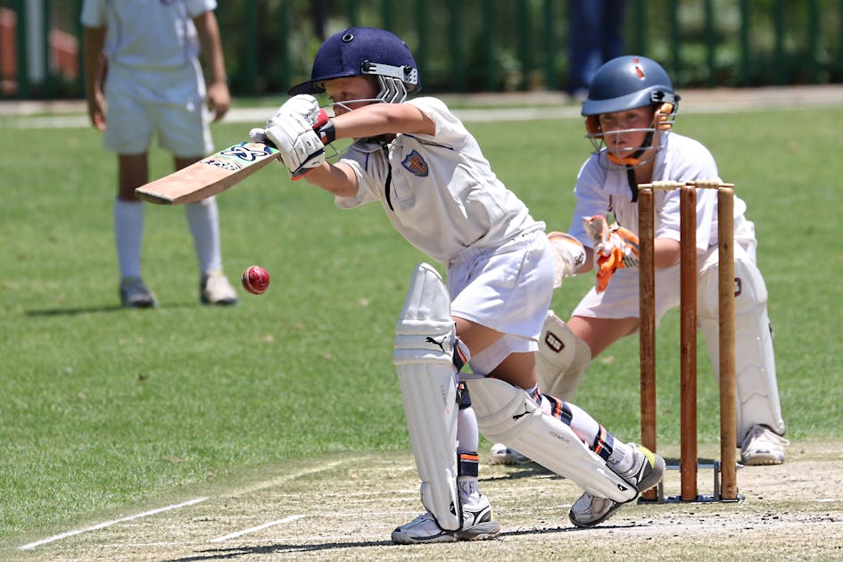 Young cricketers playing
