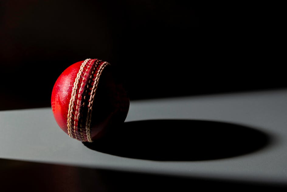 Close-up of a red cricket ball
