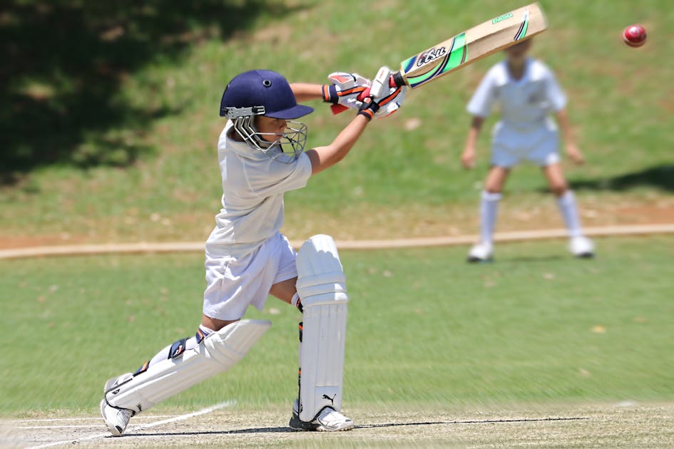 Young cricketer batting