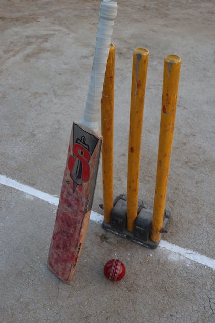 Cricket bat, ball and stumps